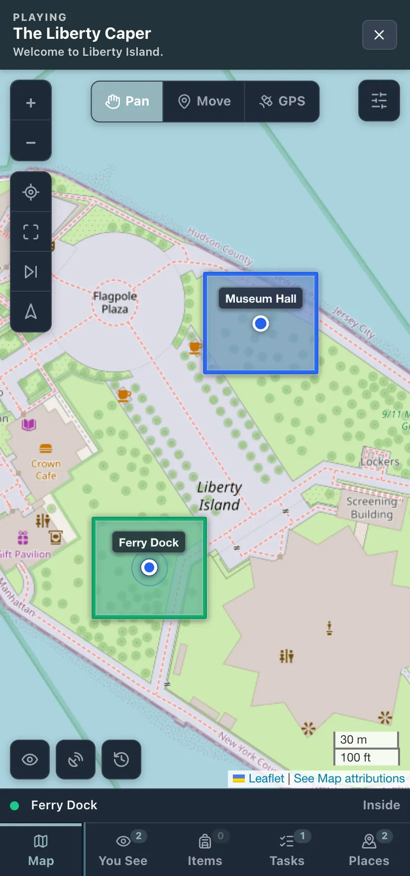 The Wherigo Player on a phone in dark mode: the map fills the whole screen, a line at the foot of it names the nearest place, and five tabs run along the bottom.