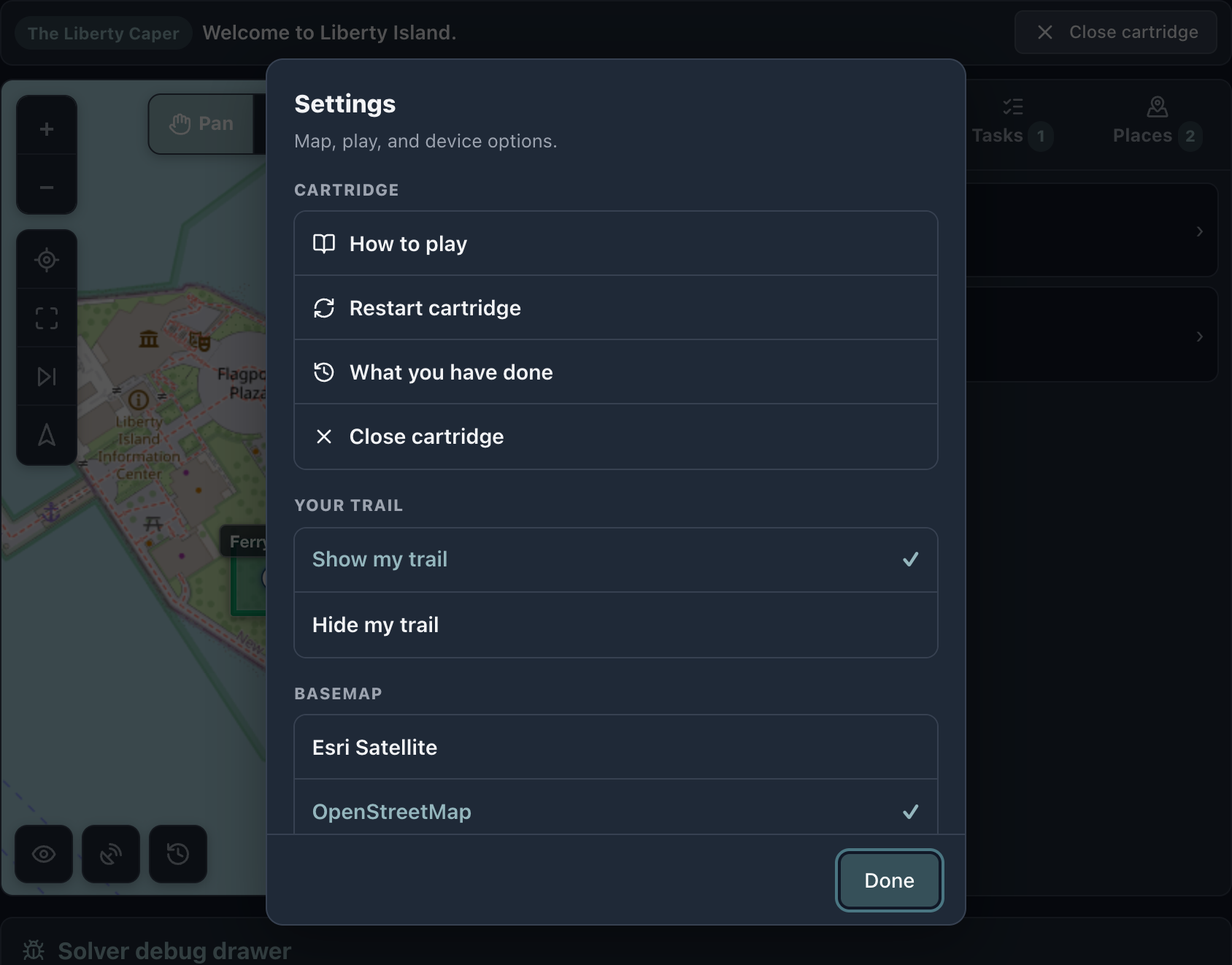 The player settings sheet in dark mode, listing cartridge actions, a choice of basemaps and distance units.
